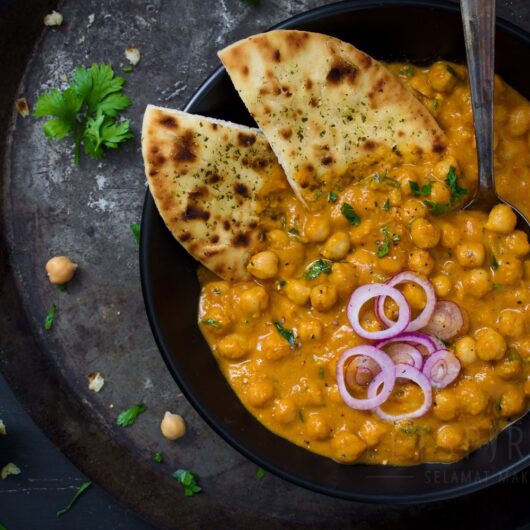 Chana masala kikkererwten in kruidige tomatensaus